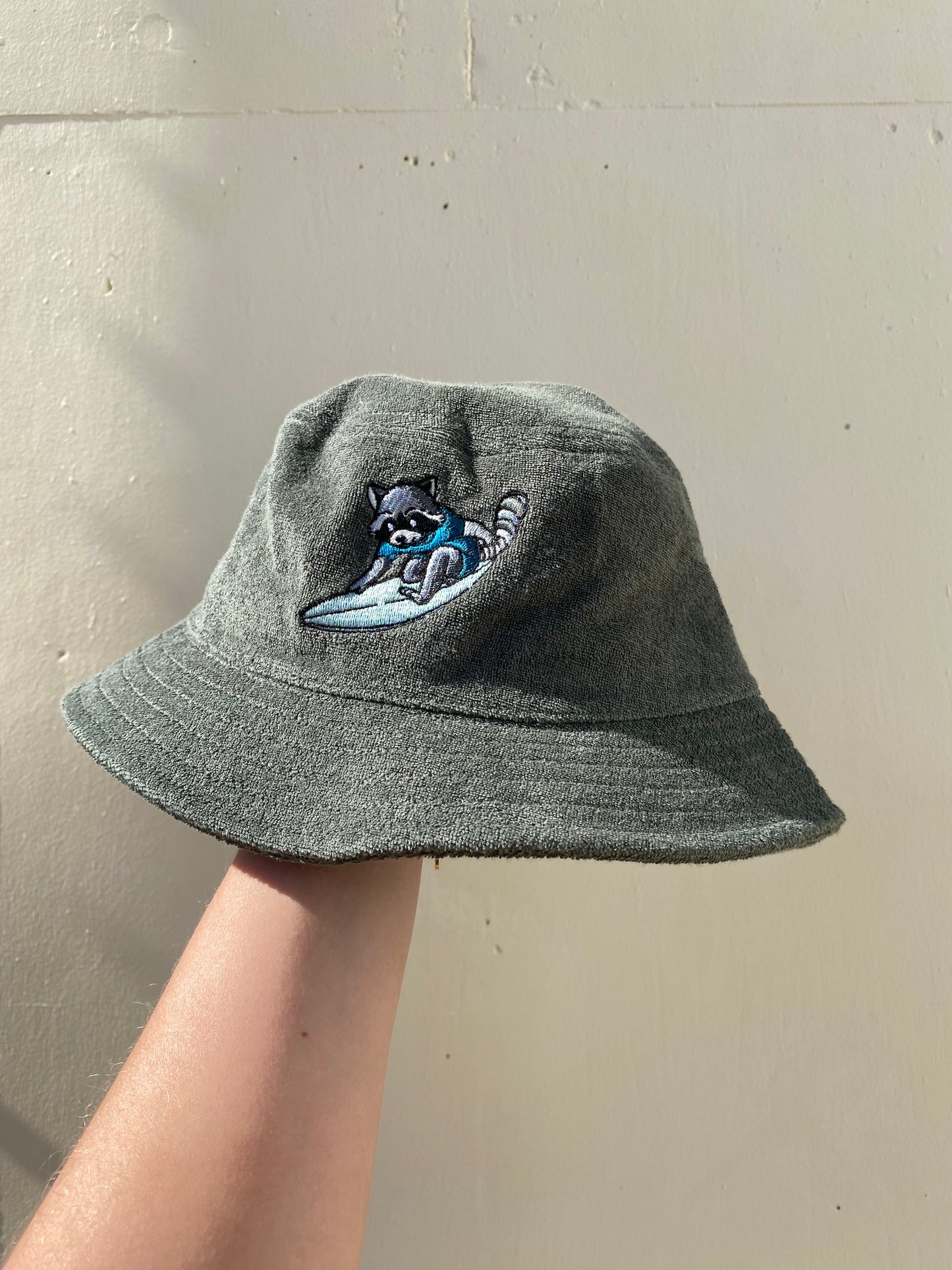 Surfing Raccoon Towelled Bucket Hat