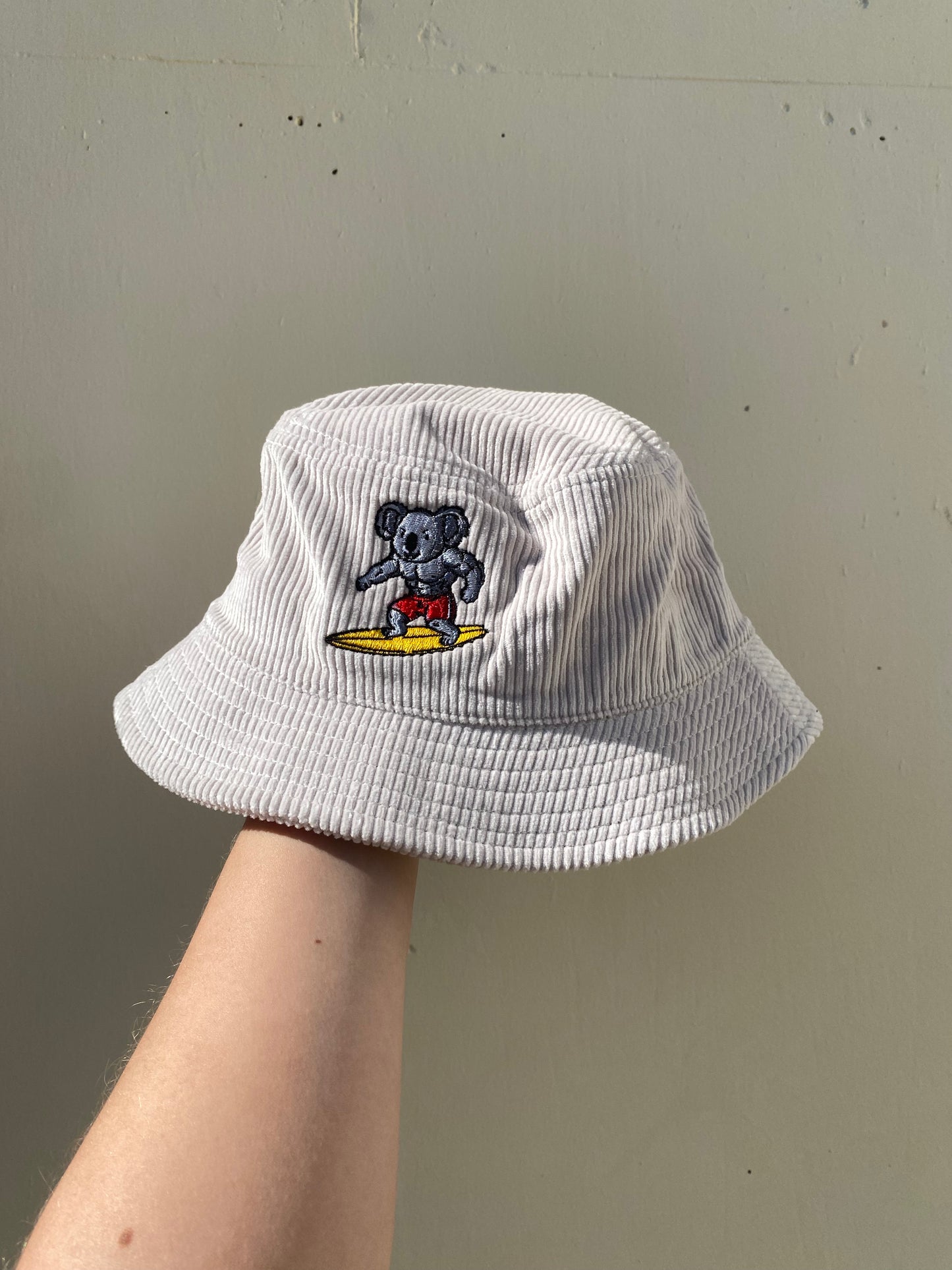 Surfing Koala Cord Bucket Hat
