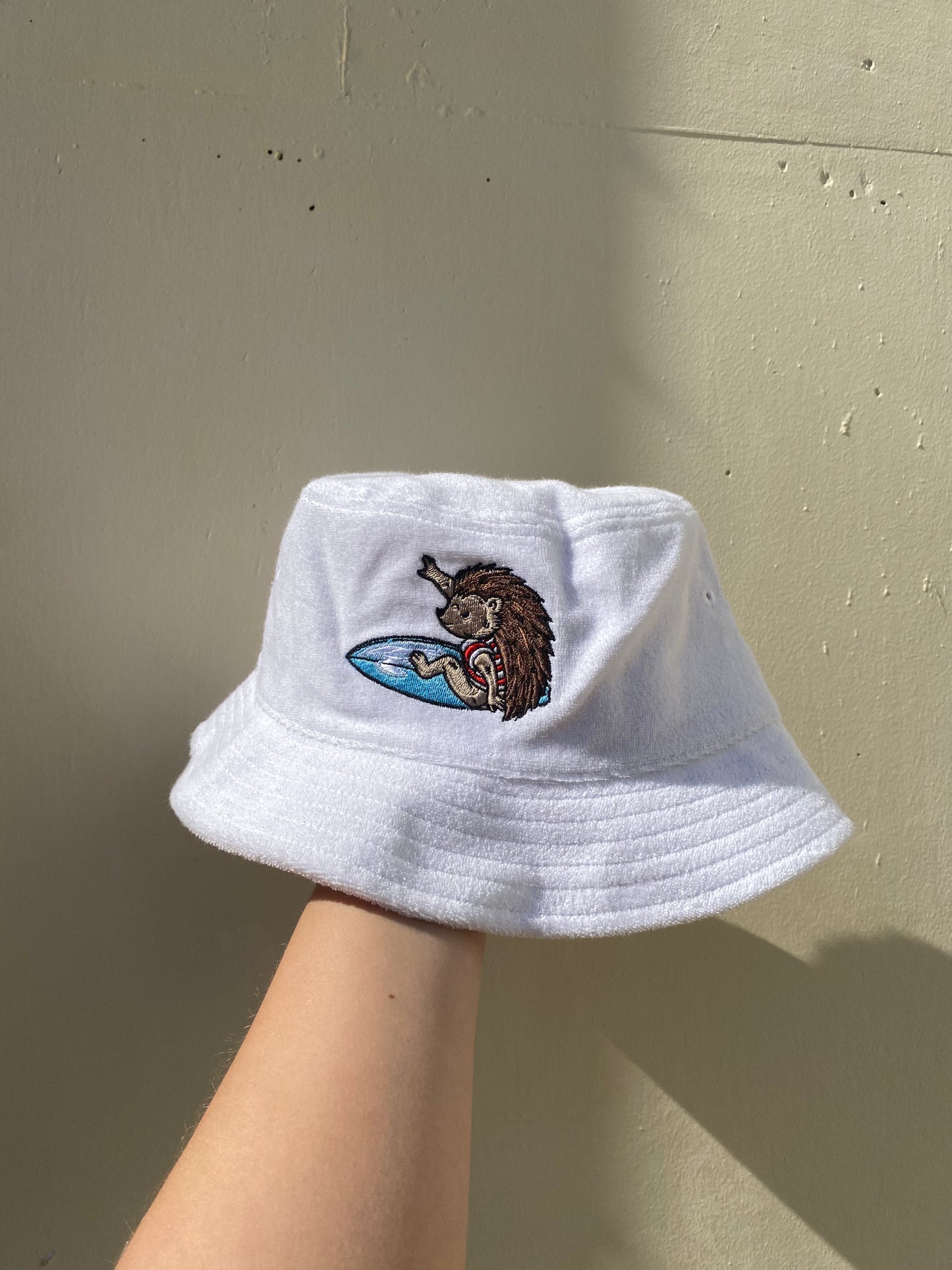 Surfing Hedgehog Towelled Bucket Hat