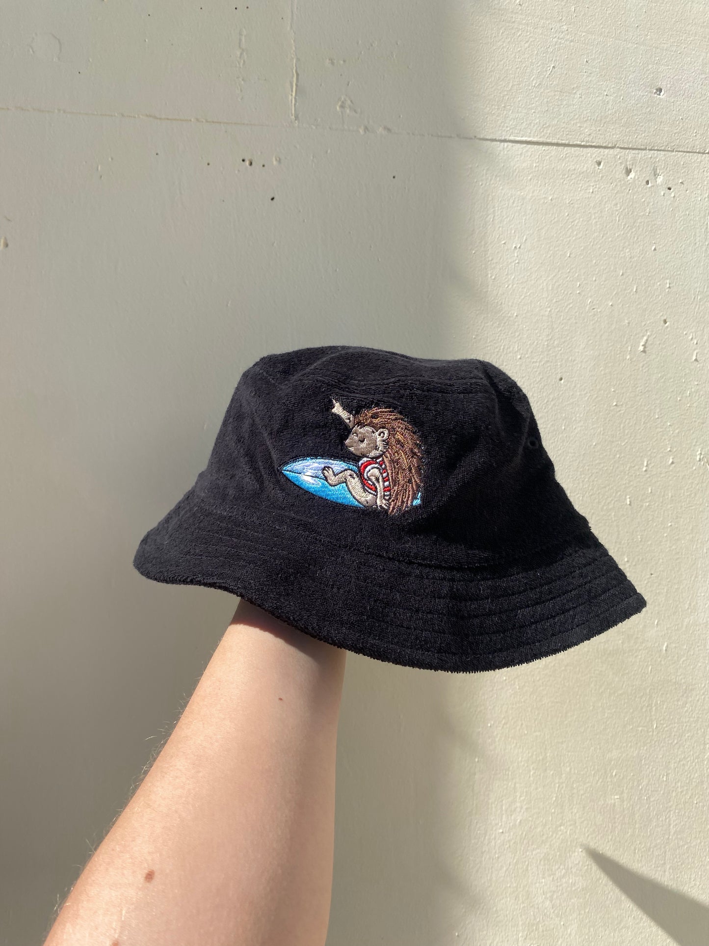Surfing Hedgehog Towelled Bucket Hat